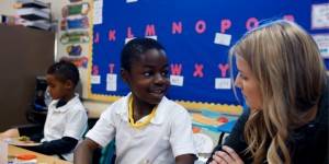 Student and Teacher talking